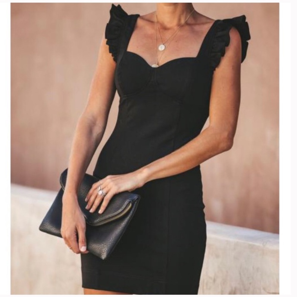 Black body-con mini dress from Vici. Size Medium